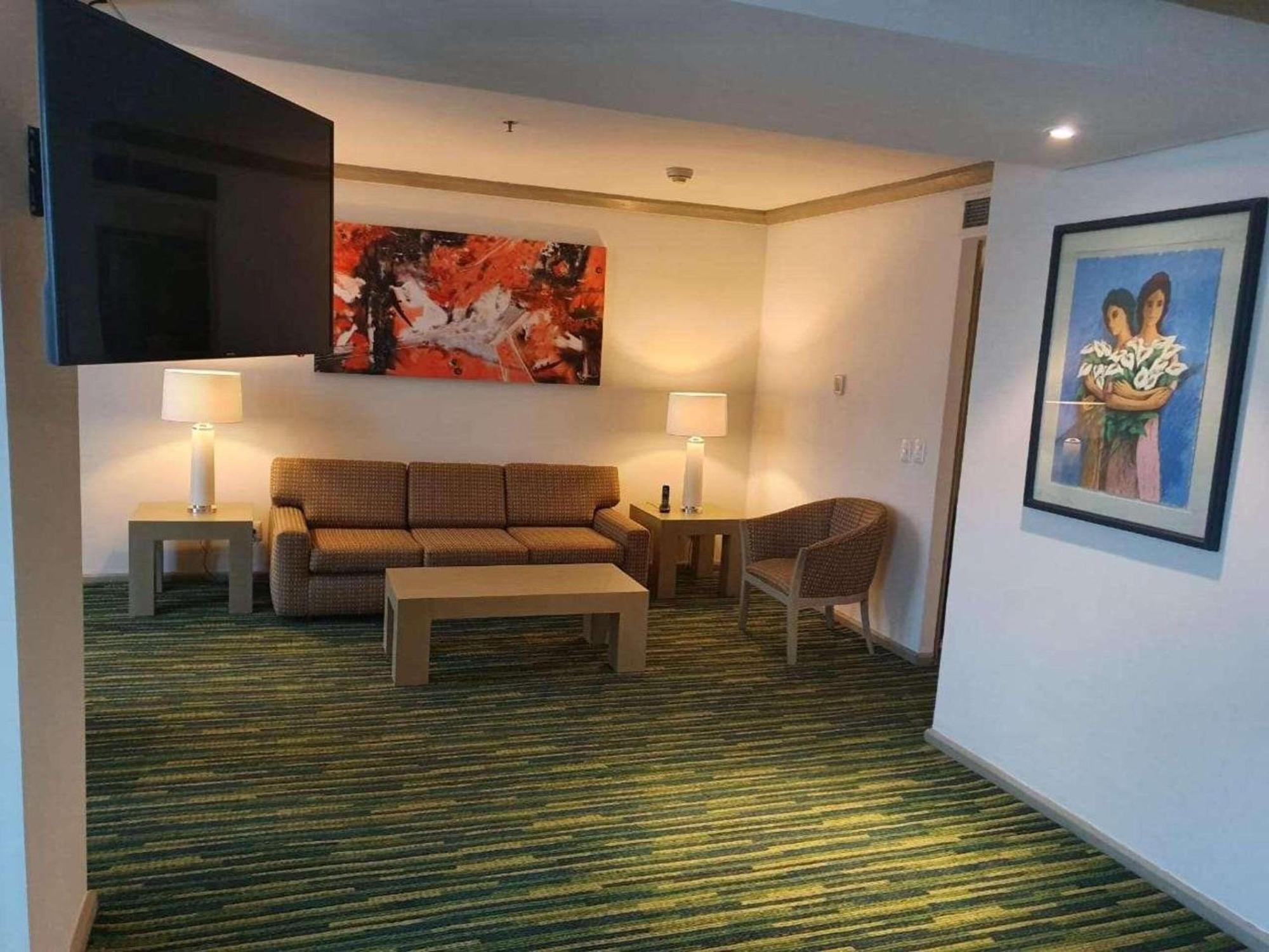 래디슨 파라이소 호텔 멕시코 시티 외부 사진 A living room at the hotel
